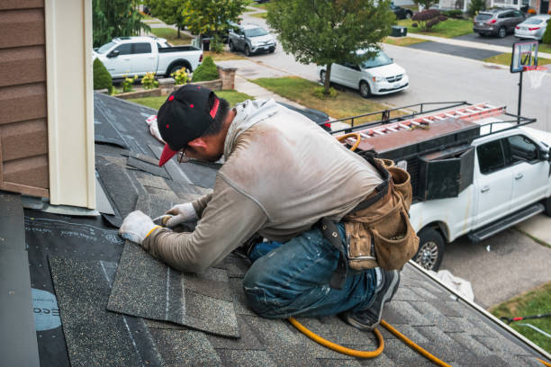 Professional Flat Roof Repair technician working in Medina, WA
